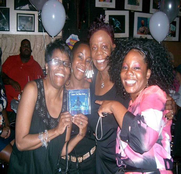 Sharan Trotter, Vocalist Sherry Amour, Laretha & Diamond with a copy of “Dance the Blues Away” at Laretha’s Album Release Party